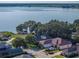 Stunning lakefront homes with lush trees and landscaping offer serenity and picturesque views at 184 Melissa Trl, Auburndale, FL 33823