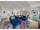 Expansive bonus room boasts multiple seating areas, colorful decor, and ample lighting for a versatile space at 184 Melissa Trl, Auburndale, FL 33823