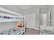 Bedroom with bunk beds, carpet and closet space at 1902 Altavista Cir, Lakeland, FL 33810