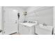 Functional laundry room with washer, dryer and wash basin at 1902 Altavista Cir, Lakeland, FL 33810