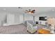 Spacious upstairs living room with comfortable seating and a ceiling fan at 1902 Altavista Cir, Lakeland, FL 33810