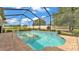 Sparkling in-ground pool with a built-in spa, brick surround, and a screened enclosure for year-round enjoyment at 1902 Altavista Cir, Lakeland, FL 33810
