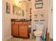 Well-maintained bathroom features a sink, commode, mirror, and updated light fixture at 1970 Michael Tiago Cir, Maitland, FL 32751