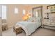 Cozy bedroom with shuttered windows, a dresser, a bed, and calming blue tones at 1970 Michael Tiago Cir, Maitland, FL 32751