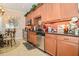 Well-equipped kitchen featuring stainless steel appliances, updated cabinetry, and a breakfast nook enhancing culinary appeal at 1970 Michael Tiago Cir, Maitland, FL 32751
