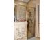 Modern tiled shower with glass enclosure, showcasing contemporary design and functionality in the bathroom at 1970 Michael Tiago Cir, Maitland, FL 32751