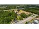 Aerial shot shows the property in a community with mature trees and nearby highway access at 2061 Crestdale Ln # 60, Lake Mary, FL 32746