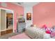 Cozy bedroom with soft decor, TV and direct access to the kitchen at 2061 Crestdale Ln # 60, Lake Mary, FL 32746