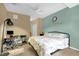 Bedroom with an accent wall and bed and home office furniture at 2061 Crestdale Ln # 60, Lake Mary, FL 32746