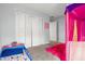 bedroom with carpeted floors, closet, and themed décor and bedding at 2850 Sanderling St, Haines City, FL 33844