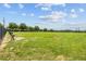 Dog park with well-maintained grass, benches, and fencing at 2850 Sanderling St, Haines City, FL 33844