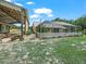 A large backyard area features a screened pool, RV parking and views of the house at 2921 W Socrum Loop Rd, Lakeland, FL 33810