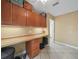 Bonus room featuring a long countertop with cabinets and a tile floor at 2921 W Socrum Loop Rd, Lakeland, FL 33810