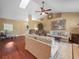 Open-concept living room boasts hardwood floors, ample seating, and natural light at 2921 W Socrum Loop Rd, Lakeland, FL 33810