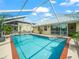 Inviting screened-in pool with plenty of space for entertaining at 2921 W Socrum Loop Rd, Lakeland, FL 33810