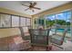 Enclosed sunroom with tile floor and view of screened in pool at 2921 W Socrum Loop Rd, Lakeland, FL 33810