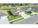 Aerial view of a well-maintained single-Gathering home with a three-car garage and green lawn at 2966 Flying Blackbird Rd, Bartow, FL 33830