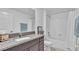 Modern bathroom featuring a granite countertop vanity and bathtub with white subway tile at 2966 Flying Blackbird Rd, Bartow, FL 33830