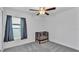 Empty bedroom featuring a window with blinds and a ceiling fan at 2966 Flying Blackbird Rd, Bartow, FL 33830