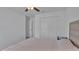Neutral bedroom featuring a ceiling fan, closet and light gray carpet at 2966 Flying Blackbird Rd, Bartow, FL 33830