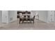 Open dining area with a dark wood dining table and bench seating at 2966 Flying Blackbird Rd, Bartow, FL 33830