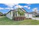 Charming single-story home with a well-manicured lawn and a two-car garage at 2966 Flying Blackbird Rd, Bartow, FL 33830