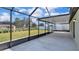 This screened patio is perfect for outdoor living with a great backyard view at 2966 Flying Blackbird Rd, Bartow, FL 33830