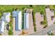 This aerial view shows the home's landscaping, brick pavers, and proximity to other homes at 3052 Wood Duck Dr, Polk City, FL 33868