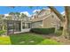 Enjoy the screened-in porch and a lush green lawn at 3107 Stonewater Dr, Lakeland, FL 33803