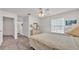 Bright bedroom with neutral colors, large windows, and comfortable furnishings at 3107 Stonewater Dr, Lakeland, FL 33803