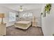 Well-lit bedroom with neutral color scheme, ceiling fan, and plenty of natural light at 3107 Stonewater Dr, Lakeland, FL 33803