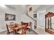 Formal dining room with wooden table and chairs near stairway at 3107 Stonewater Dr, Lakeland, FL 33803