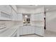 Bright kitchen featuring white cabinetry and modern appliances at 3107 Stonewater Dr, Lakeland, FL 33803