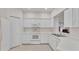 Clean kitchen with white cabinets and modern appliances. Lots of storage space at 3107 Stonewater Dr, Lakeland, FL 33803