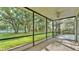 Spacious screened porch with views of the lush backyard and mature trees at 3107 Stonewater Dr, Lakeland, FL 33803