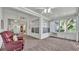 Relaxing sunroom with comfortable seating and plenty of natural light at 3107 Stonewater Dr, Lakeland, FL 33803