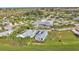Aerial view showing the home and the community area with clubhouse and pool at 3270 Green Heron Dr, Polk City, FL 33868