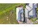 Overhead shot of home showcasing its roof, landscaping, and RV parking at 3270 Green Heron Dr, Polk City, FL 33868