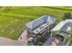 Aerial view of a charming home with RV parking and proximity to the golf course at 3270 Green Heron Dr, Polk City, FL 33868