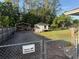 Fenced backyard featuring security cameras at 3646 Sherertz Road, Lakeland, FL 33810