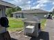 View of the backyard with its great space, new paint, and green grass at 3646 Sherertz Road, Lakeland, FL 33810