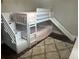 Cozy bedroom featuring a bunk bed with stairs and a slide for added fun at 3646 Sherertz Road, Lakeland, FL 33810