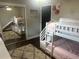 Bedroom featuring stylish bunk beds, mirrored closet doors, and neutral color palette at 3646 Sherertz Road, Lakeland, FL 33810