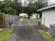 Gated property with workshop and security cameras for added privacy and protection at 3646 Sherertz Road, Lakeland, FL 33810