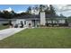 Charming single story home with a spacious front yard and landscaped garden at 3646 Sherertz Road, Lakeland, FL 33810