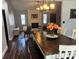 Open concept living area with view of fireplace and comfortable seating at 3646 Sherertz Road, Lakeland, FL 33810