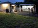Exterior view of workshop featuring lighting, and tool storage area with exterior access at 3646 Sherertz Road, Lakeland, FL 33810