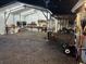 Brightly lit workshop area featuring shelving, work benches, and tool storage at 3646 Sherertz Road, Lakeland, FL 33810