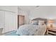 Cozy bedroom boasts neutral tones, a comfortable bed, and ample closet space for a serene retreat at 3934 Aquilla Dr, Lakeland, FL 33810