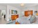 Beautiful main bedroom featuring a spacious layout, wood furniture, and an ensuite bathroom at 3934 Aquilla Dr, Lakeland, FL 33810